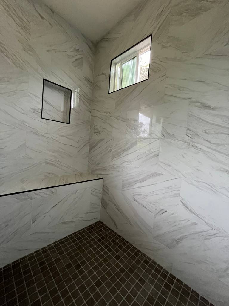 Full-Height Marble Tiles built-in shower seat and niche