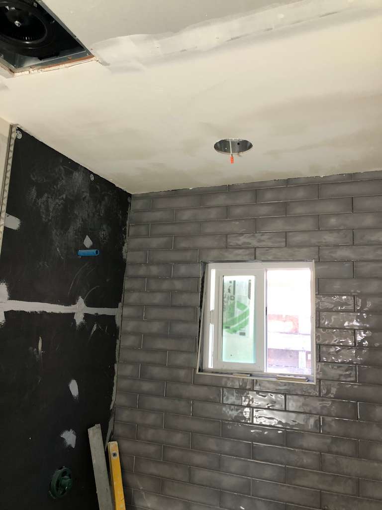 tile-work-in-process-for-bathroom-shower-walls