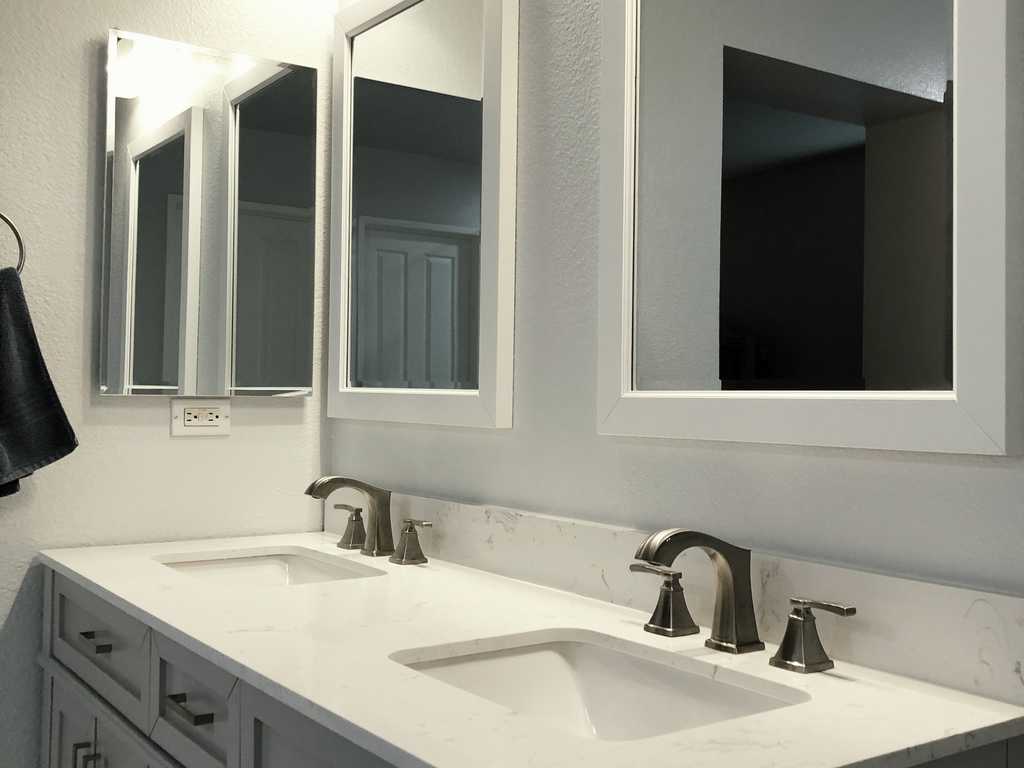 bathroom-remodel-A2M-Contractors-famed mirrors above a vanity