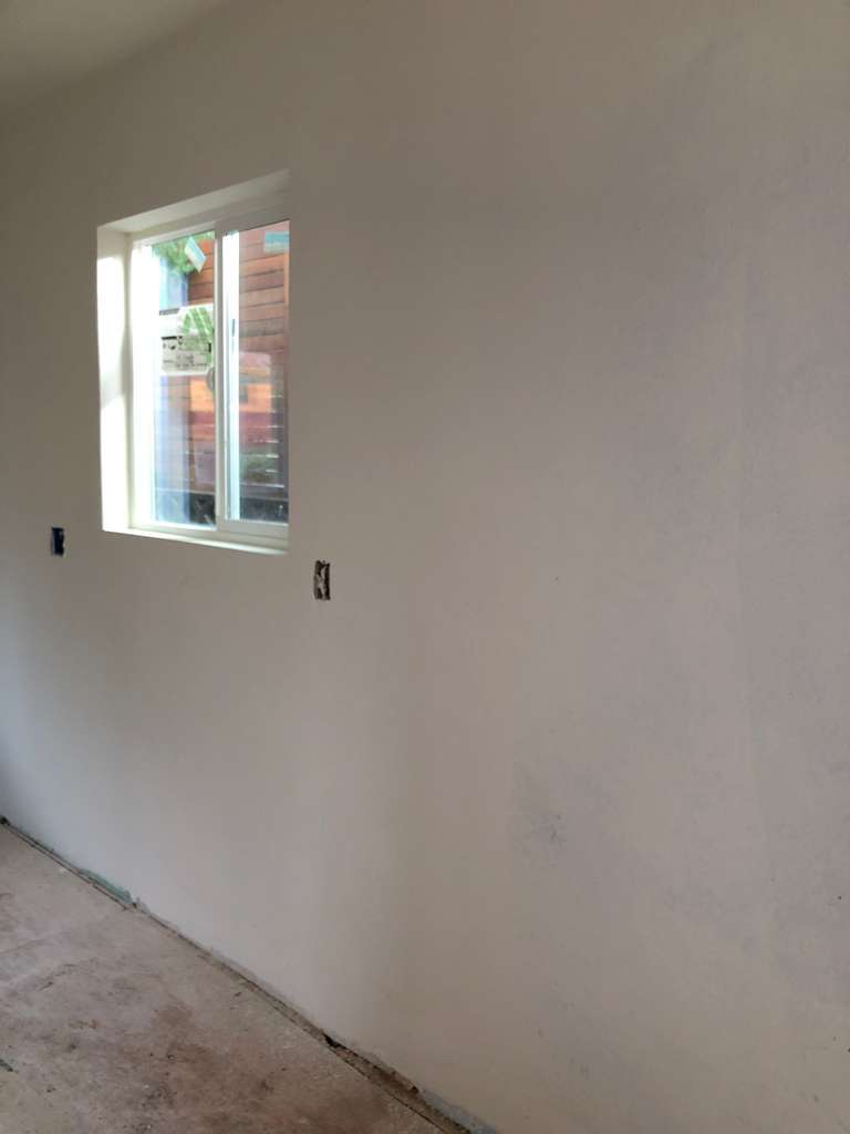 first coat of paint over drywall