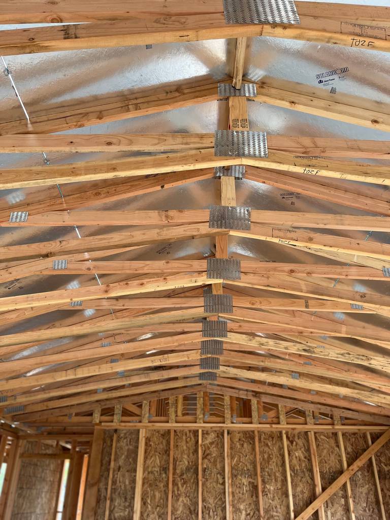 close up inside the ceiling showing the roof joists