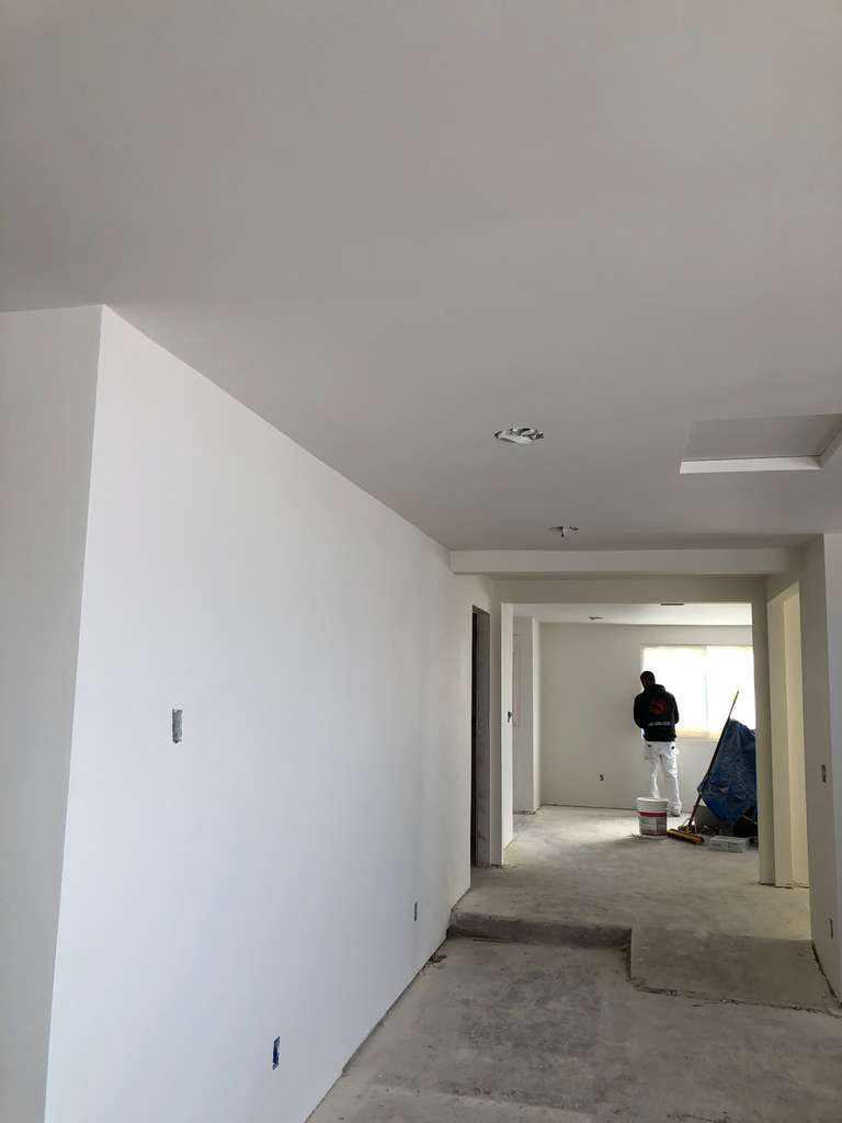 drywall-applied-to-living-room-walls-in-home-addition