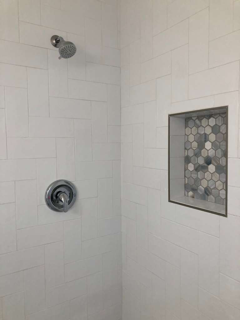 tile panel shower wall in the new bathroom