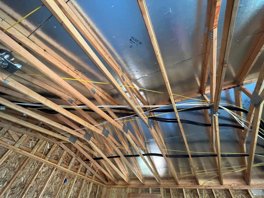 electrical connections running through the roof trusses