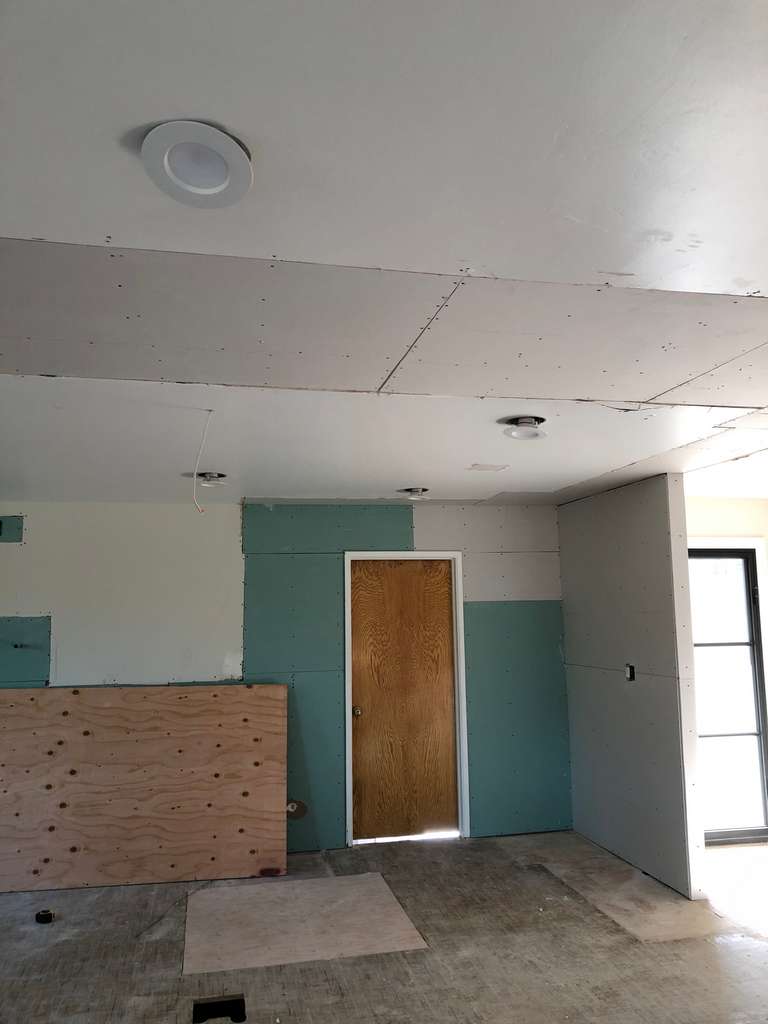 drywall installed on the ceiling