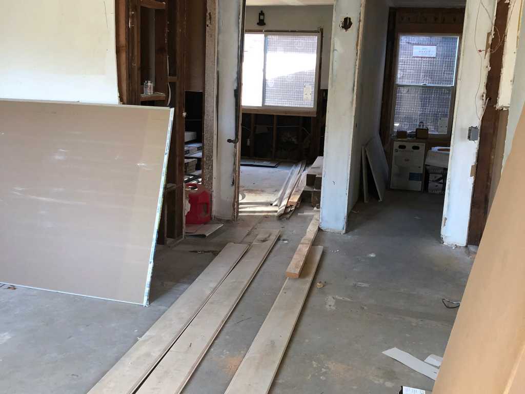 a2mContractors finsihing a two-story wood deck