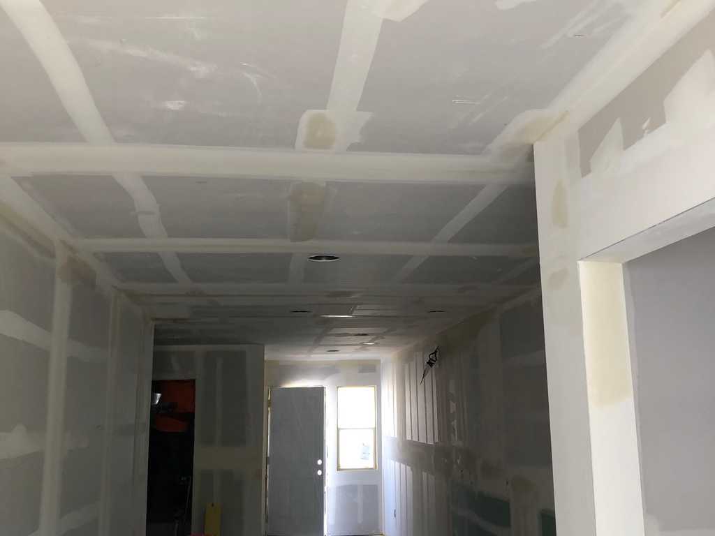ADU drywall with paper tape with. drywall mud applied