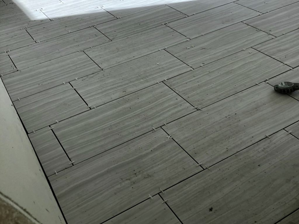 Flexible Tile Spacers between Ceramic Floor Tiles. a2mContractors