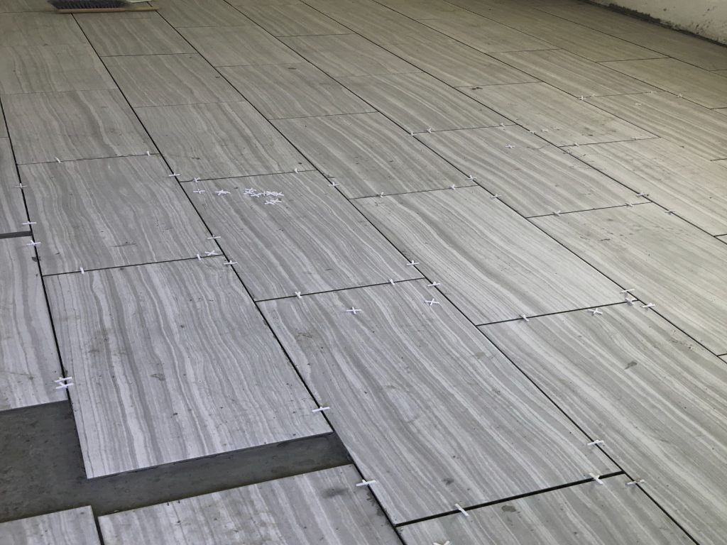 Setting Ceramic Floor Tiles, a2mcontractors