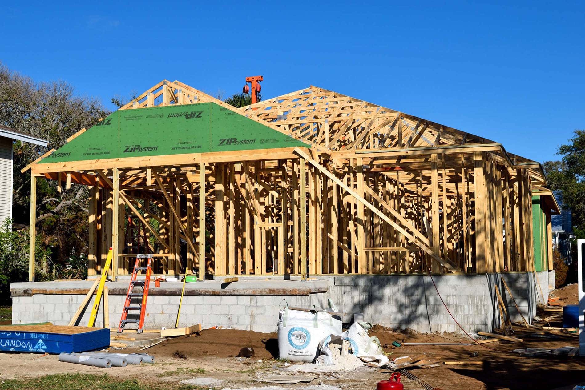 new home-brick-foundation-wood-framing