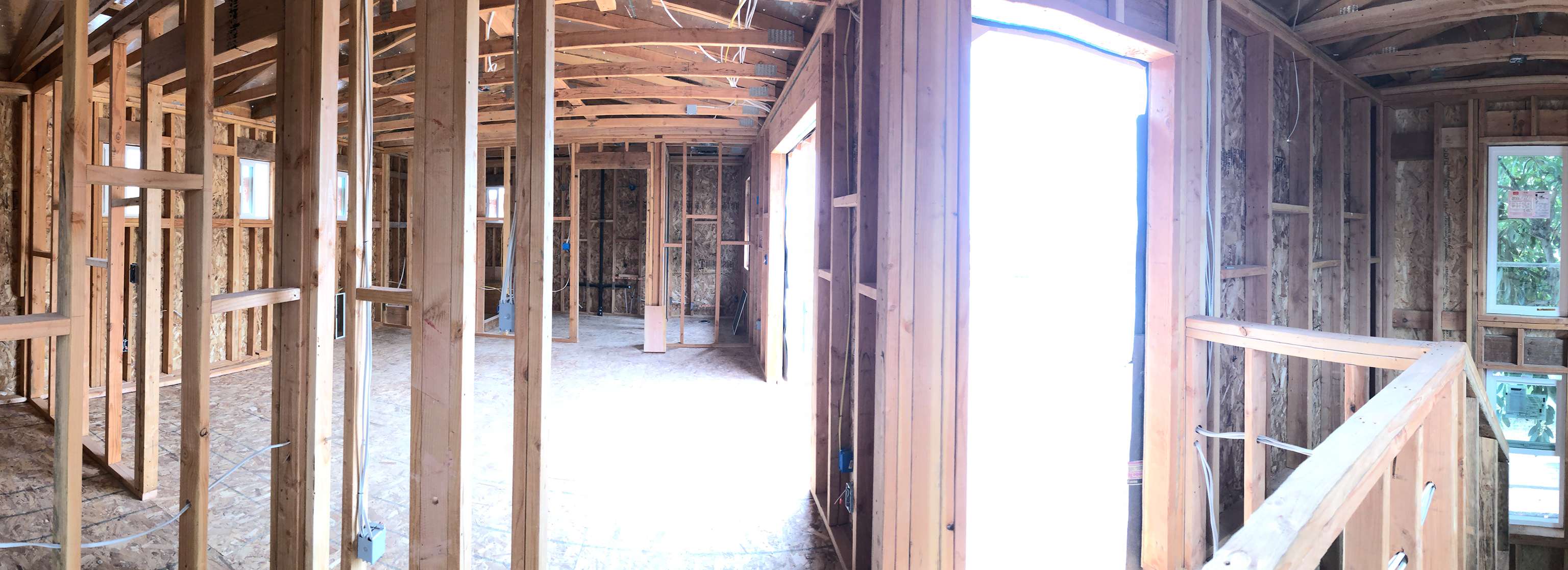 panoramic-view-of-rough-inside-framing-in-Remodel-and-Home-Addition